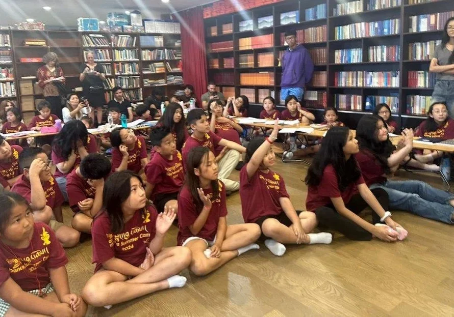 Children in library during educational event.